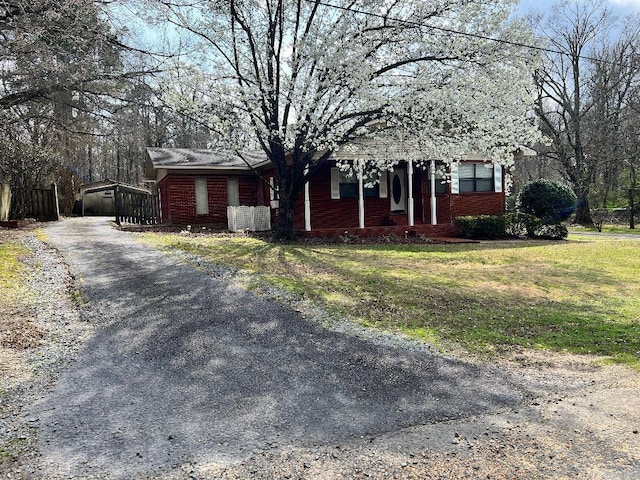 view of front of home with a front lawn