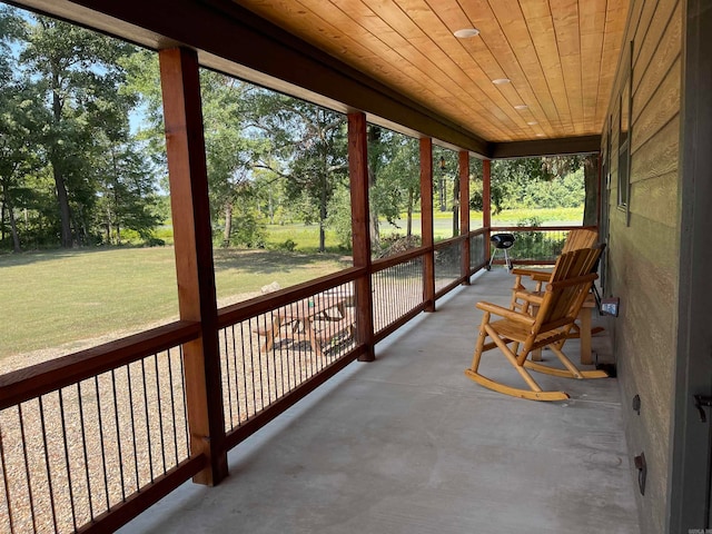 sunroom / solarium with wooden ceiling