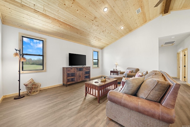 living room with vaulted ceiling with beams, wood ceiling, and light hardwood / wood-style floors