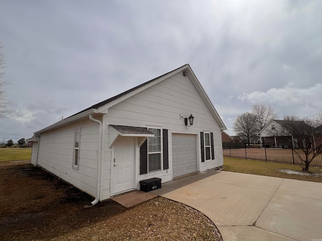 rear view of property featuring a lawn