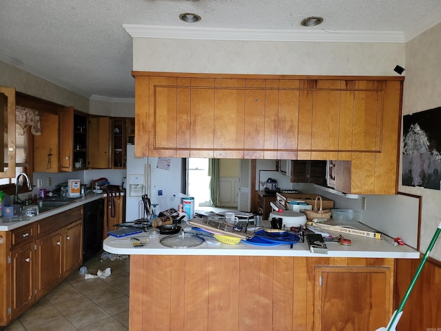 kitchen featuring kitchen peninsula, white refrigerator with ice dispenser, sink, a textured ceiling, and ornamental molding