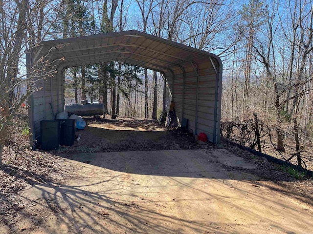 exterior space with a carport