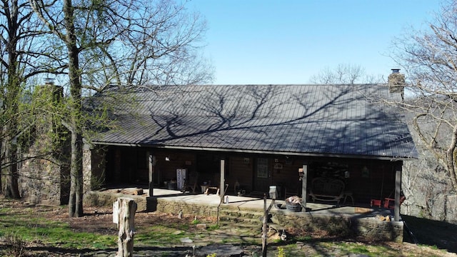 back of property with a patio area