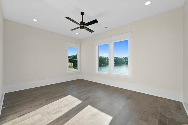 unfurnished room with visible vents, baseboards, ceiling fan, wood finished floors, and recessed lighting