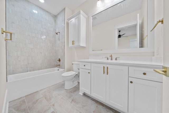 bathroom featuring toilet, visible vents, vanity, a ceiling fan, and tub / shower combination