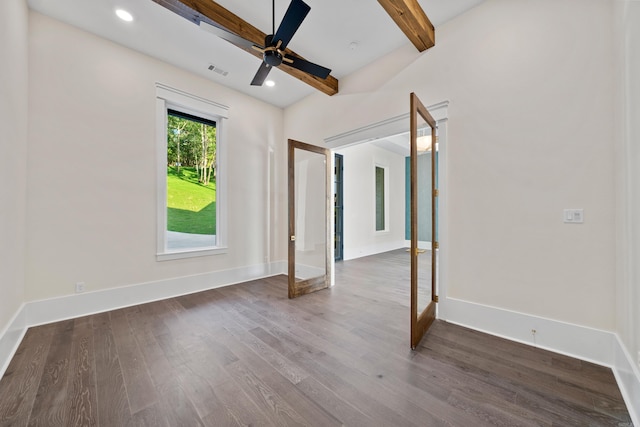 unfurnished room with recessed lighting, visible vents, wood finished floors, beamed ceiling, and baseboards