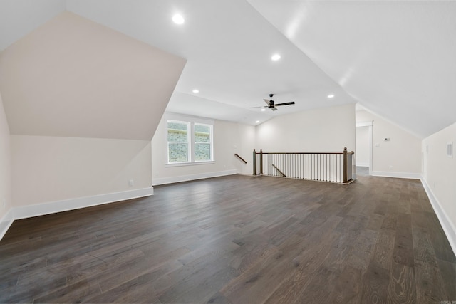 bonus room with ceiling fan, lofted ceiling, recessed lighting, baseboards, and dark wood-style floors