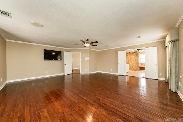 empty room with ceiling fan, crown molding, dark hardwood / wood-style floors, and a textured ceiling