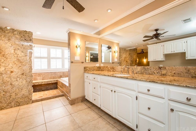 bathroom with vanity, ceiling fan, tile flooring, a relaxing tiled bath, and crown molding