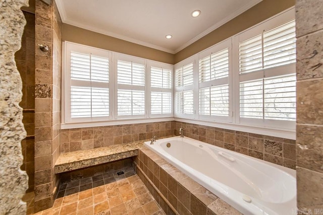 bathroom featuring crown molding, tile flooring, and a relaxing tiled bath