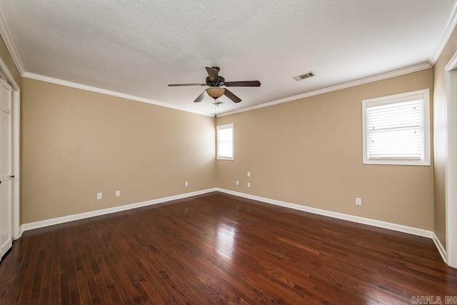 spare room with crown molding, dark hardwood / wood-style flooring, a textured ceiling, and ceiling fan