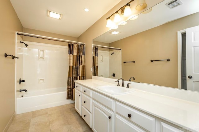 bathroom featuring tile flooring, large vanity, and shower / bath combo with shower curtain