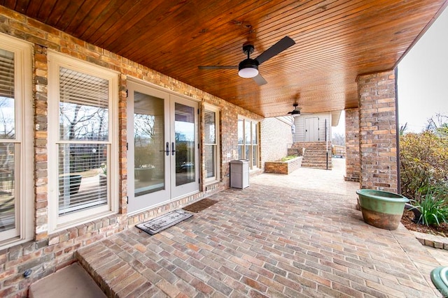 view of patio featuring ceiling fan