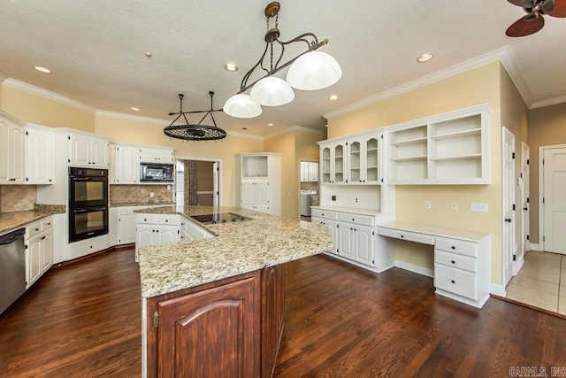 kitchen with white cabinets, dark hardwood / wood-style floors, black appliances, and an island with sink