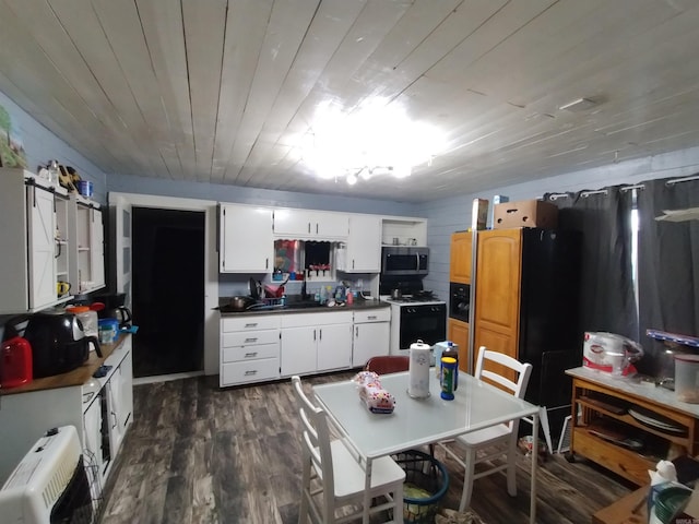 kitchen featuring white stove, white cabinets, dark hardwood / wood-style floors, wood ceiling, and radiator heating unit