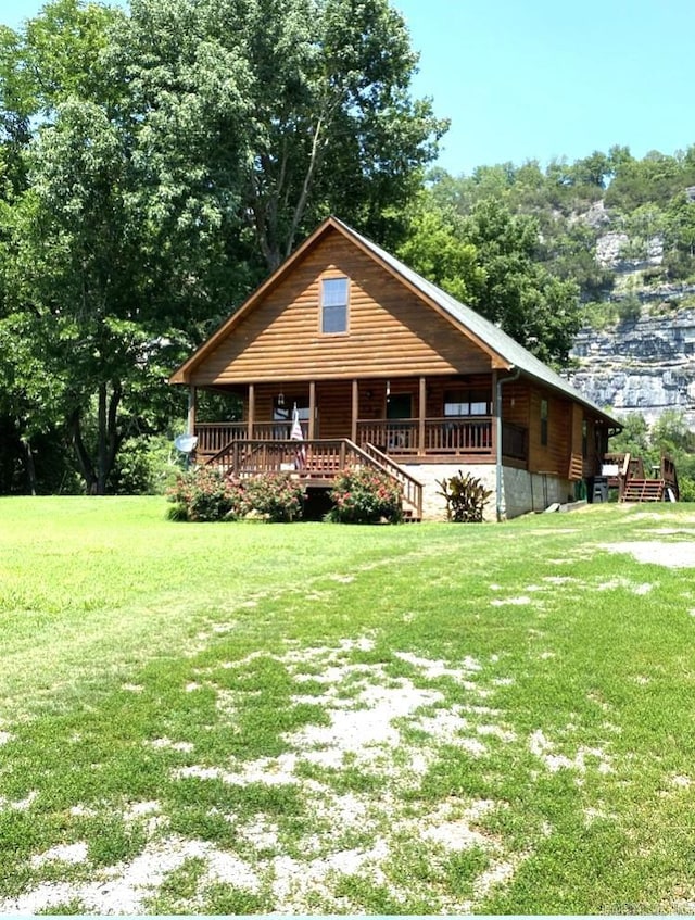 log home featuring a front yard