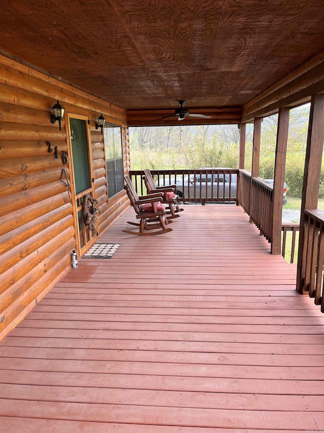 wooden deck with ceiling fan