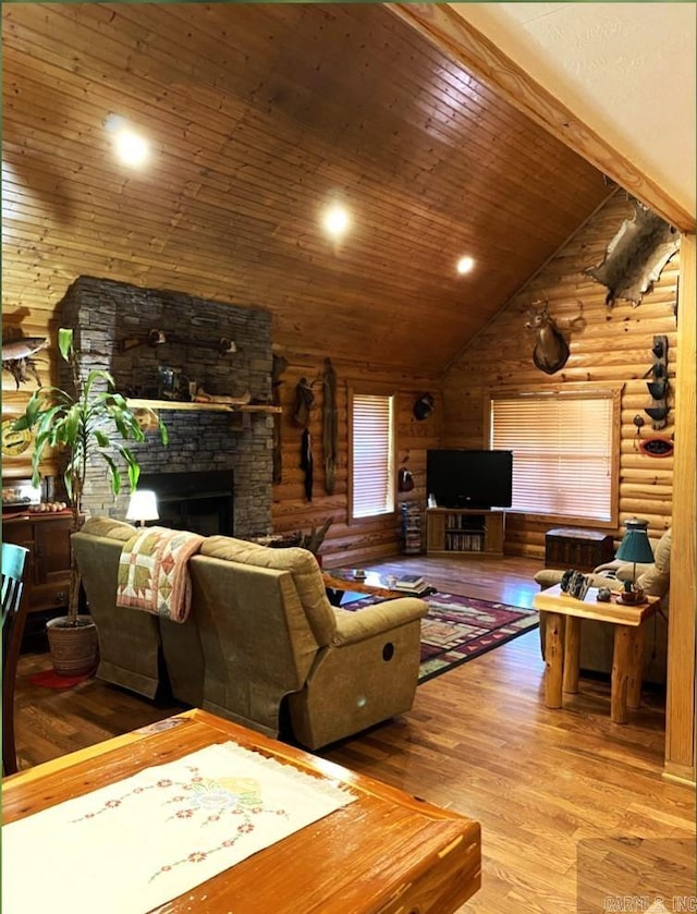 living room featuring a fireplace, rustic walls, vaulted ceiling, wood ceiling, and wood-type flooring