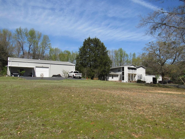 view of yard with a garage