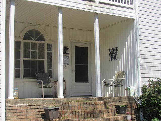 property entrance with a porch