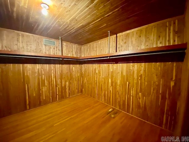 spacious closet featuring hardwood / wood-style flooring