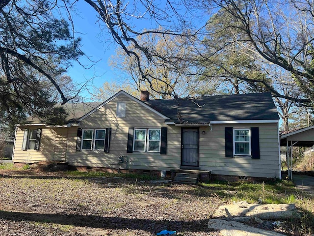 single story home with a carport