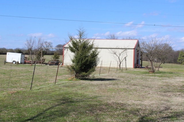 view of yard with an outdoor structure