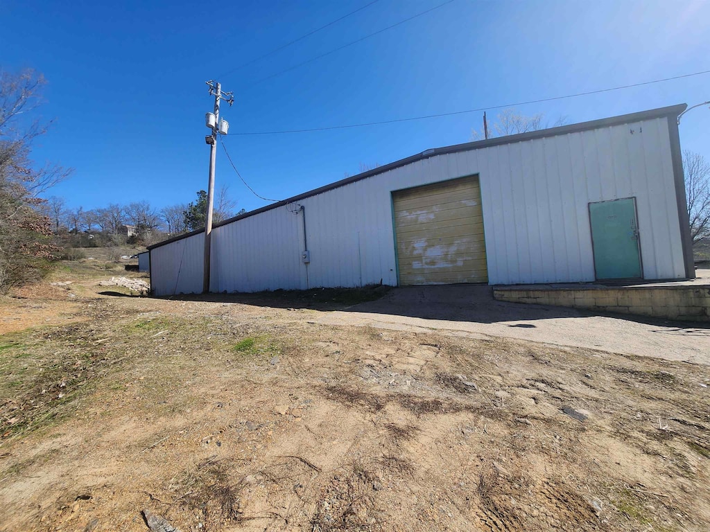 view of outdoor structure featuring a garage