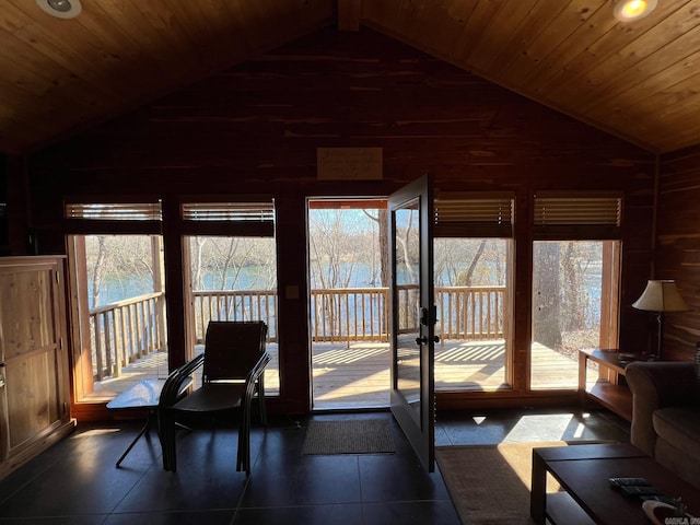 sunroom / solarium with lofted ceiling and wooden ceiling