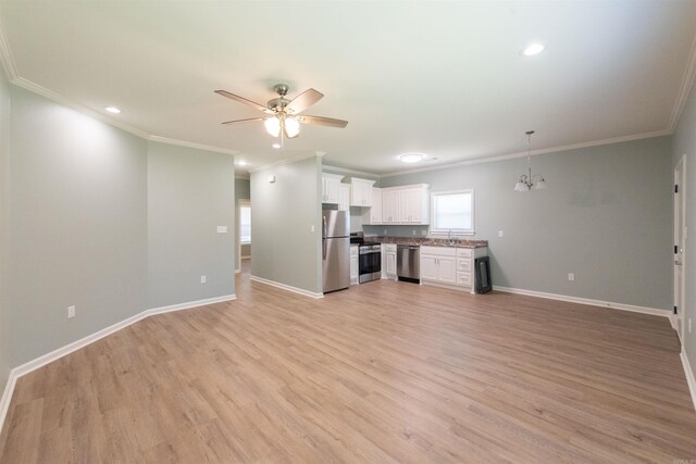 spare room with crown molding