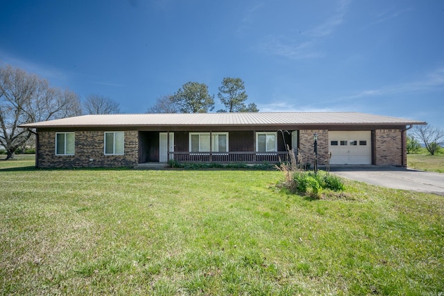 single story home with a front lawn and a garage