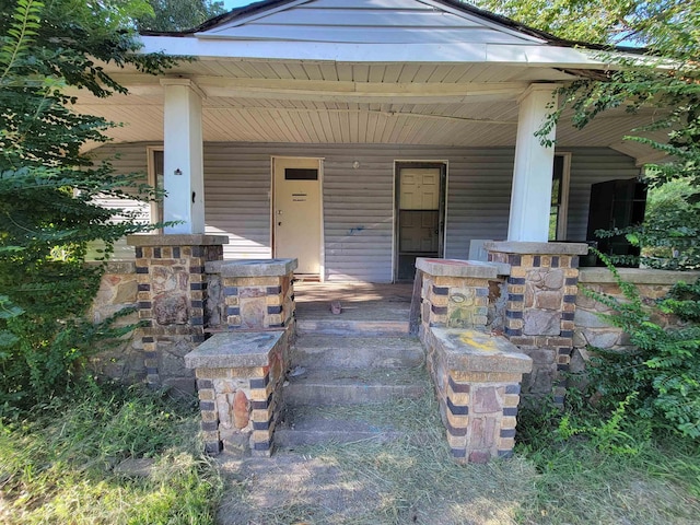 property entrance with a porch