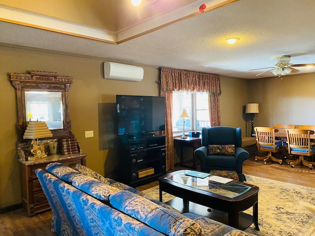 living room featuring a wall mounted air conditioner, ceiling fan, dark wood-type flooring, and a wealth of natural light