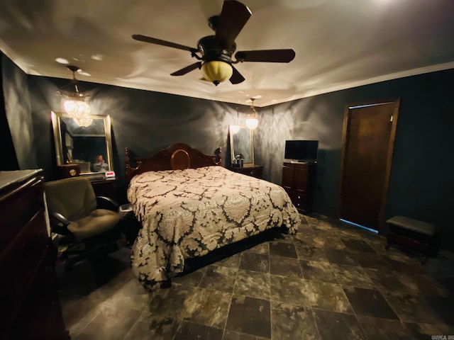 bedroom with ceiling fan and ornamental molding