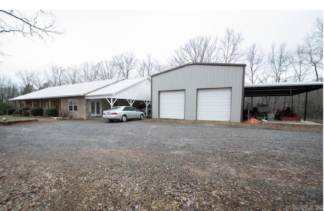 garage with a carport