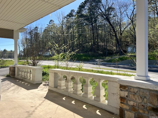 view of patio with a balcony