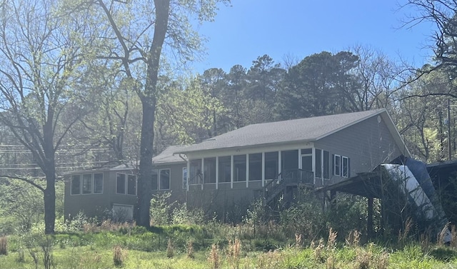 view of front facade featuring a sunroom