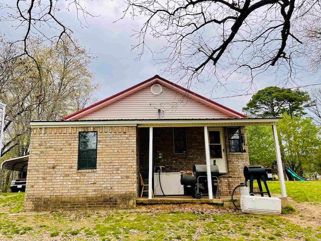 view of front of home with a playground