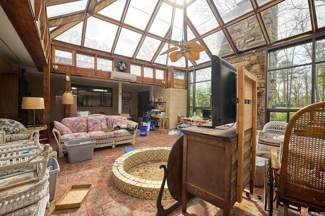 sunroom / solarium featuring lofted ceiling, a wall mounted AC, and ceiling fan