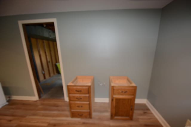 bedroom with light wood-type flooring