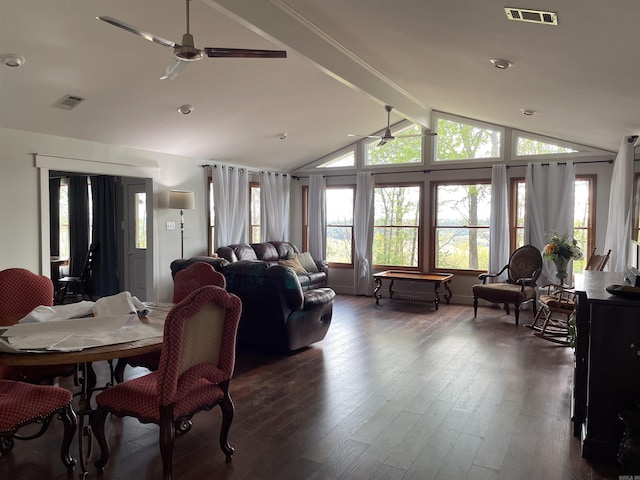 dining room featuring dark hardwood / wood-style flooring, ceiling fan, and vaulted ceiling with beams