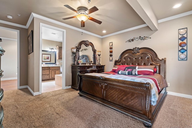 carpeted bedroom with ceiling fan, ornamental molding, beam ceiling, and ensuite bath