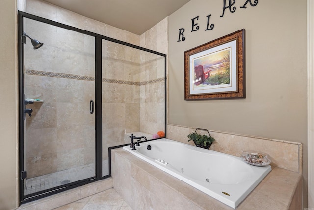 bathroom with tile floors and separate shower and tub