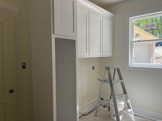 washroom featuring cabinets