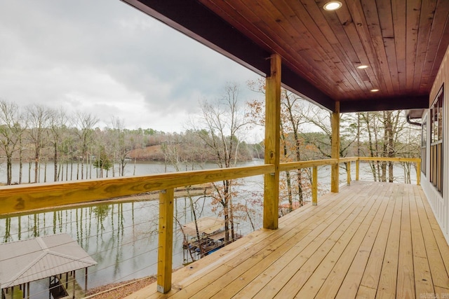 wooden deck with a water view