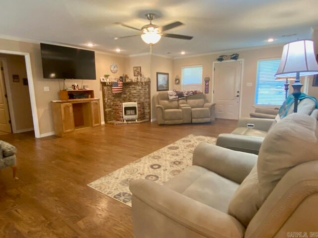 500 E Ingram St, E Camden, AR 71701 - living room featuring a ceiling fan, crown molding, and wood finished floors