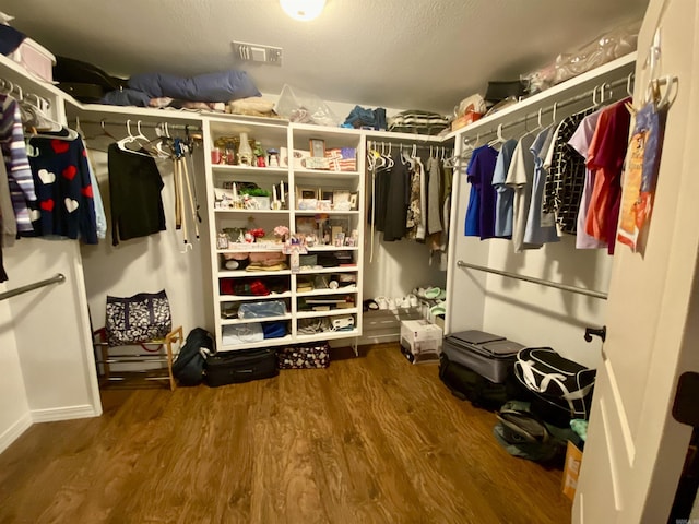 500 E Ingram St, E Camden, AR 71701 - spacious closet featuring visible vents and wood finished floors
