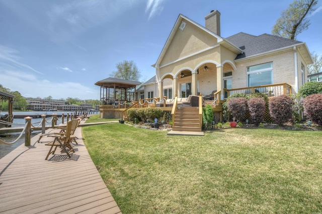 exterior space featuring a deck and a yard