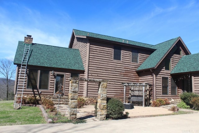 view of log home