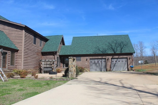 log cabin with a garage